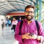Bearded-man-smiling-next-to-metro-station-street-in-Mumbai-India-560x420